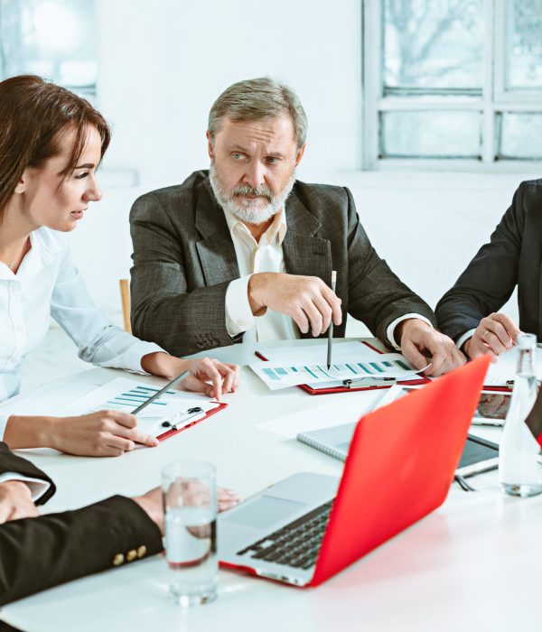 The business people working together at table. The meeting or summit concept